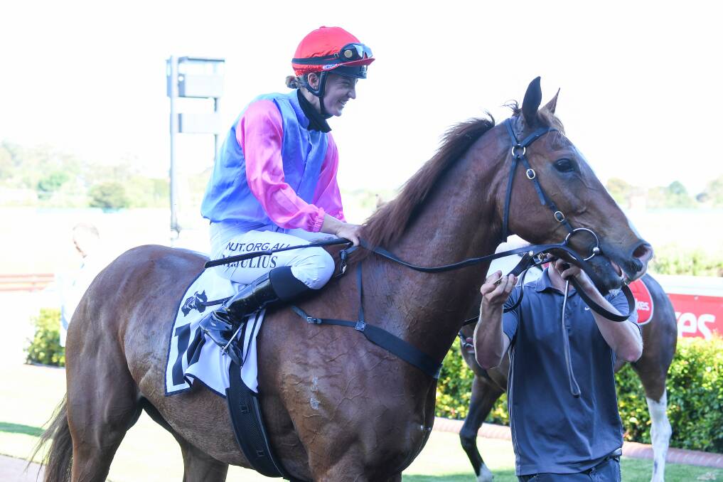 Just Folk, ridden by Melissa Julius, returns to the mounting yard after winning the Thoroughbred Club Handicap at Sandown last November. Picture: PAT SCALA/RACING PHOTOS