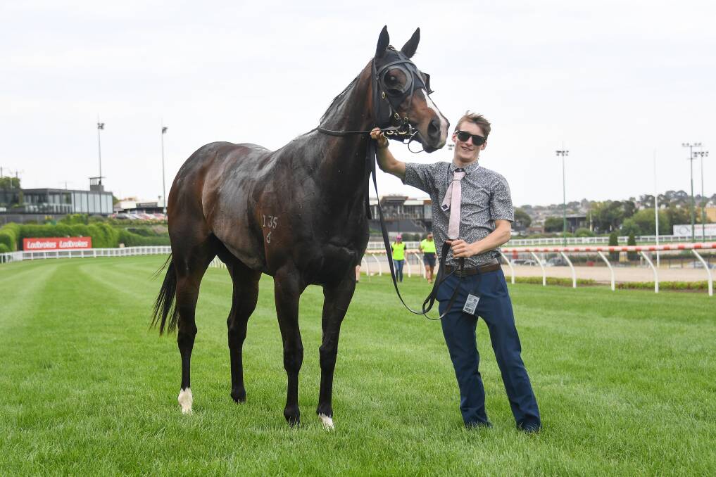 PROUD: Caine Stuart with It's Kind of Magic following the filly's win at Moonee Valley in December.Picture: NATASHA MORELLO/RACING PHOTOS