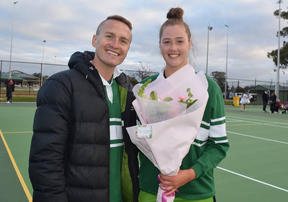 Kangaroo Flat coach Jayden Cowling with Ava Lowndes, who celebrated her 100th game for the club, in a win over South Bendigo. Picture: KIERAN ILES