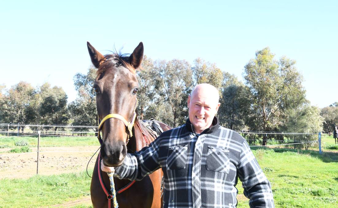 GOOD MOVE: Greg Norman with Fiftyshadesofhay, who has three wins from seven starts. Picture: KIERAN ILES
