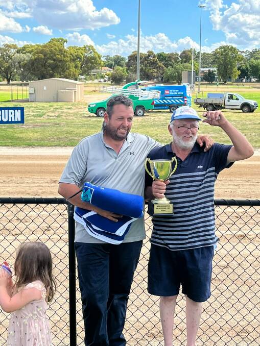 Jason McNaulty and father Noel savour Chissy's win in the 2022 Wedderburn Trotters Cup.