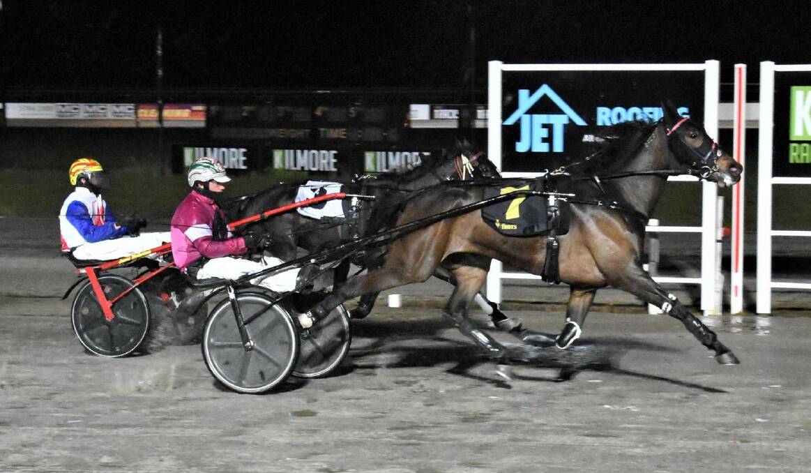 SPECIAL WIN: Mazikeen, driven by champion reinsman Greg Sugars, breaks through for her first win for Maiden Gully trainer Maree Campbell and connections at Kilmore last Friday night. Picture: CLAIRE WESTON PHOTOGRAPHY