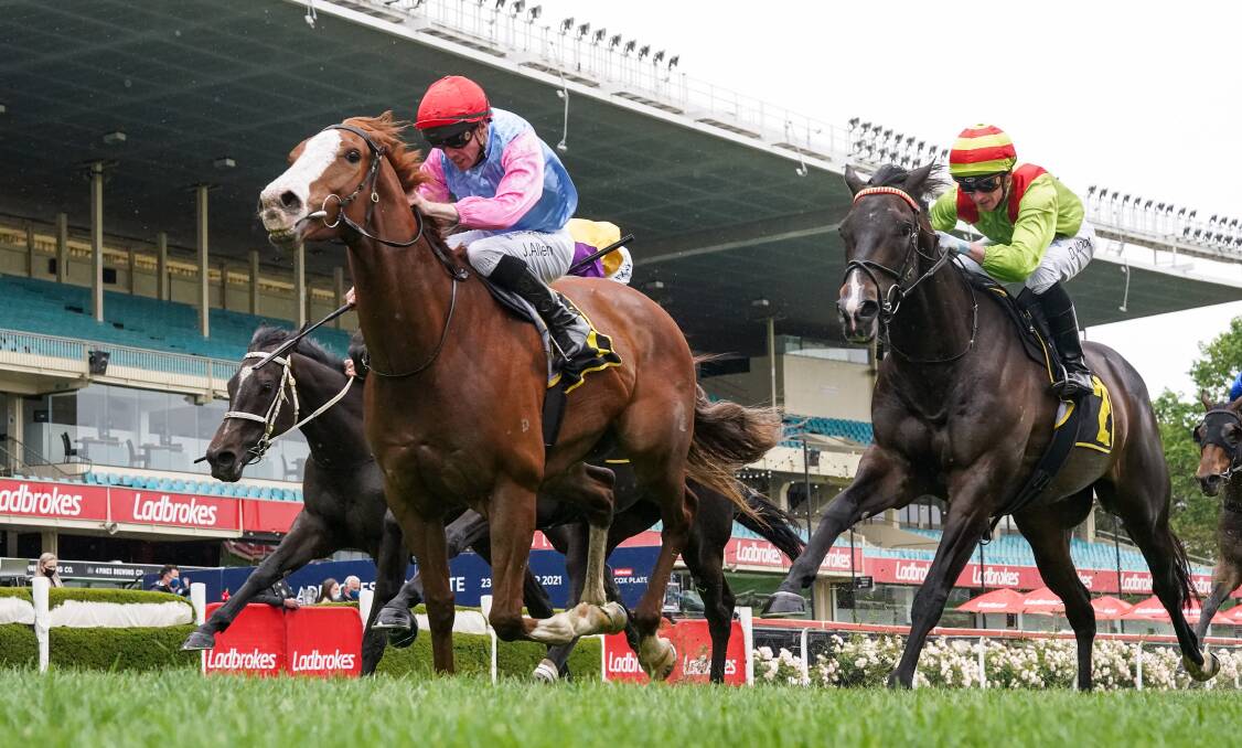 Just Folk, ridden by John Allen, wins the Group 2 Crystal Mile at Moonee Valley last Saturday. Picture: SCOTT BARBOUR/RACING PHOTOS
