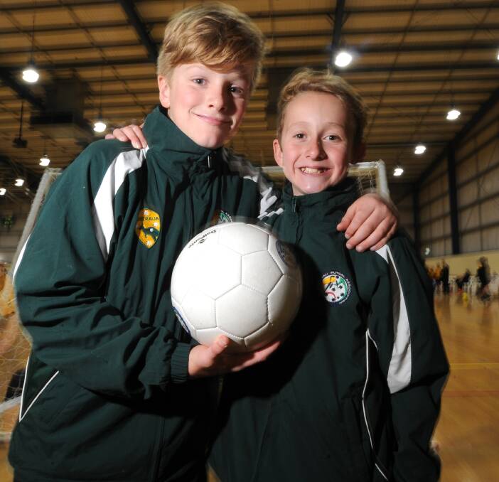 OVERSEAS BOUND: Bendigo's Hamish Walker and Mac Hilson will be teammates in Australia's under-12 futsal team to play at the 2016US National Futsal Championships  Picture: NONI HYETT