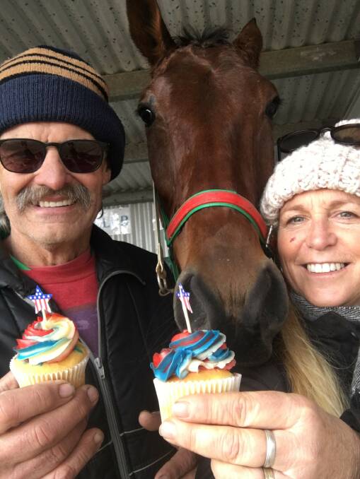 HAPPY JULY 4TH: Terry and Jacinta Gange celebrate a win at Charlton with Happyaslarry with an American-themed cup cake.