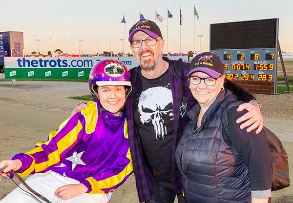 Kate Hargreaves with loyal stable owners Garry and Kim Collinson following Lorimer Lady's win at Melton in October 2019. Picture: STUART McCORMICK