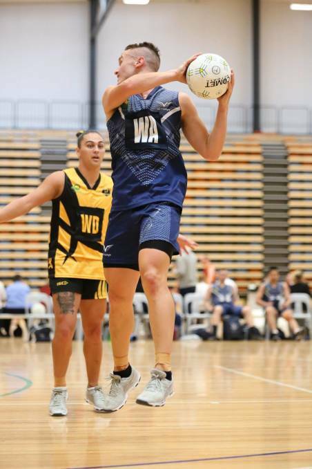 Jayden Cowling in action at the 2019 Australian Men's and Mixed Netball Championships.