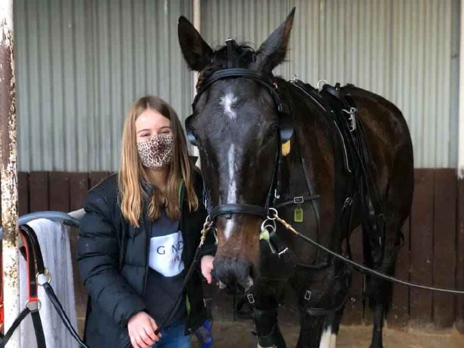 Lily Edsall-French with Form Analyst following the six-year-old pacer's win at Lord's Raceway on Saturday night. Picture: BENDIGO HARNESS RACING CLUB