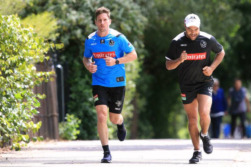 Kayle Kirby is put through his paces during Collingwood pre-season training by new Magpies assistant coach Matthew Boyd. Picture: WAYNE LUDBEY