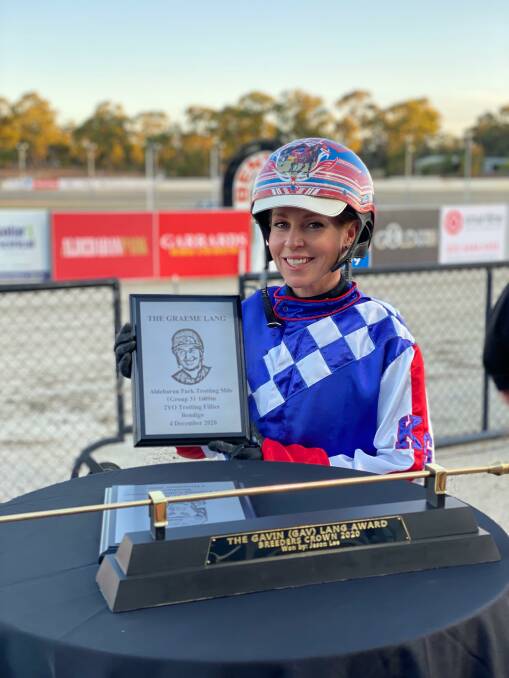Kate Gath is rewarded for a brilliant drive aboard Aldebaran Ursula on Friday night. Picture: CLAIRE WESTON PHOTOGRAPHY