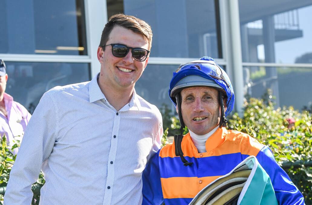 Trainer Toby Lake with jockey Damien Oliver after Volpe Risorsa won the fillies and mares benchmark 58 handicap at Bendigo on Wednesday. Picture by Brett Holburt/Racing Photos