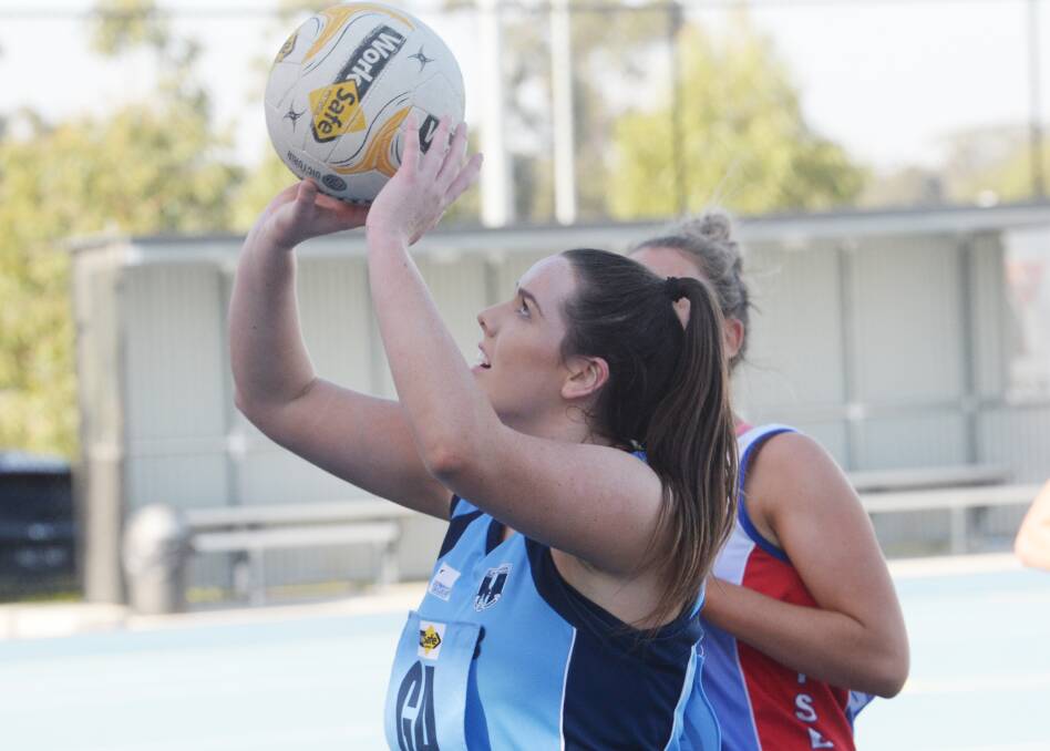 ON-TARGET: Goal attack Abbey Ryan takes aim during Eaglehawk's impressive victory against Gisborne at Canterbury Park on Saturday. Picture: DARREN HOWE