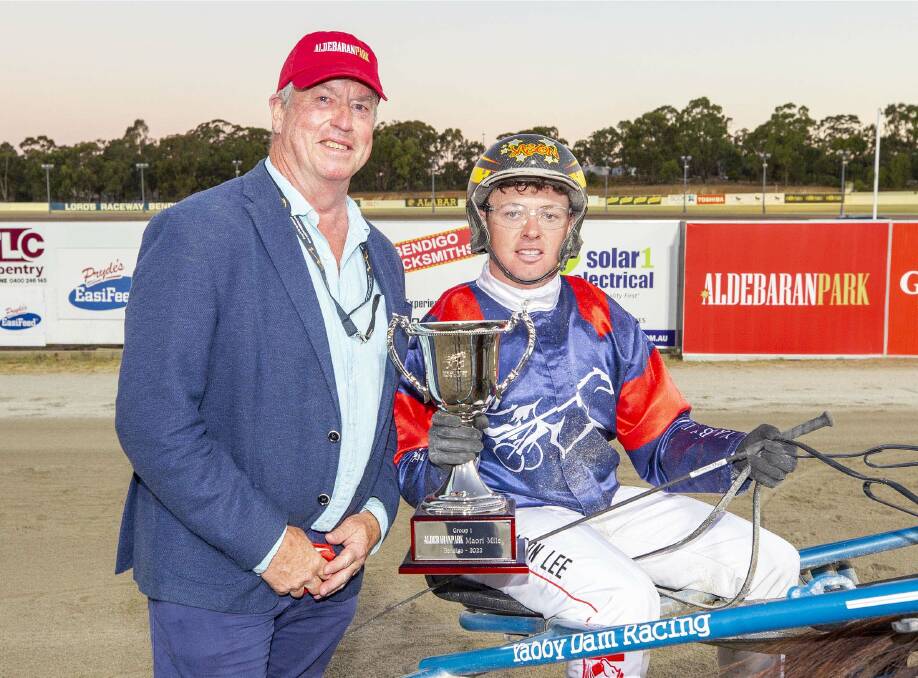 Jason Lee with the Group 1 Maori Mile trophy, which was presented by race sponsor, Aldebaran Park principal Duncan McPherson OAM. Picture: STUART McCORMICK