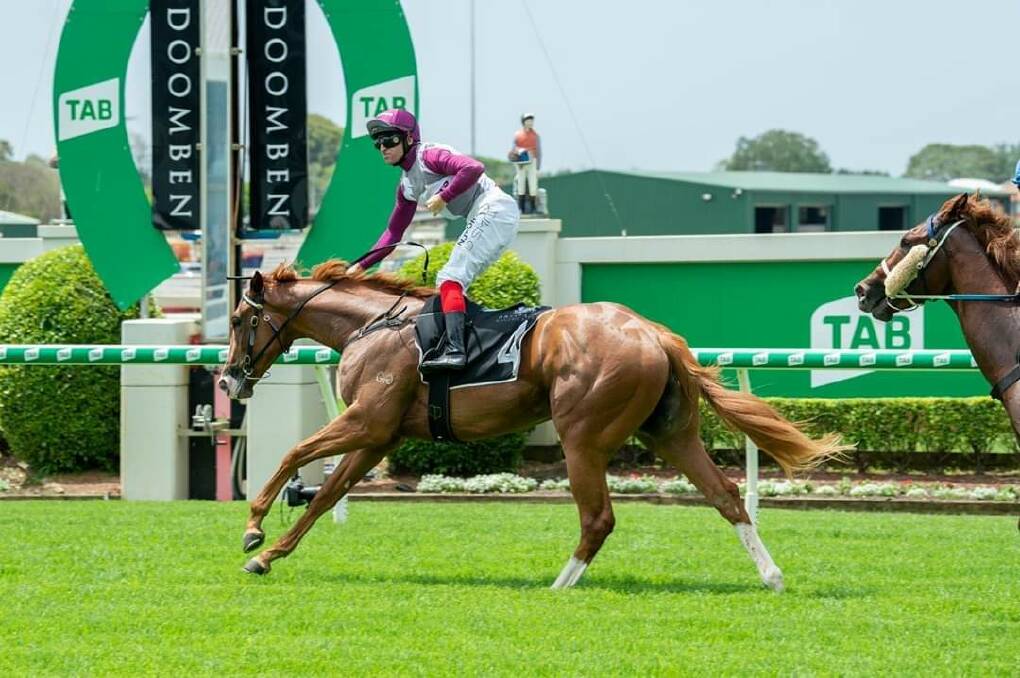 PUMPED: Dale Smith guides Dusty Tycoon to victory at Doomben last November. The filly will run in Saturday's $2 million Magic Millions Classic on the Gold Coast.