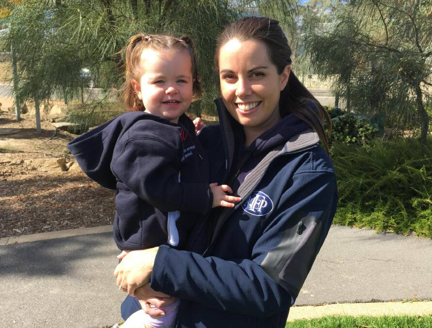 EXCITED: Chantal Moore with daughter Evie ahead of her first game as Mount Pleasant's A-grade netball coach. Picture: KIERAN ILES