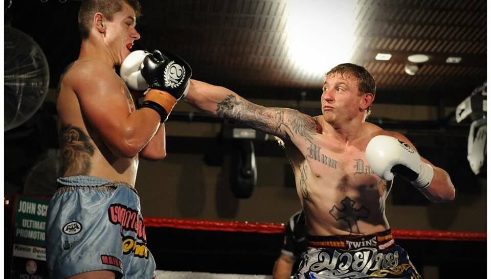 WINNING DEBUT: Bendigo's 'Dangerous Dave Patterson goes on the attack against Geelong's Mat Wilson. Picture: TERRY VORG, kickboxing.com.au