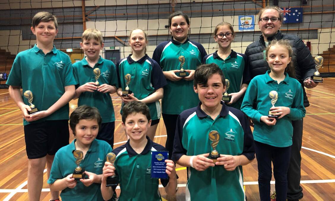 Specimen Hill Primary School's premiership-winning minis volleyball team, with coach Belinda Seymour. Picture contributed.