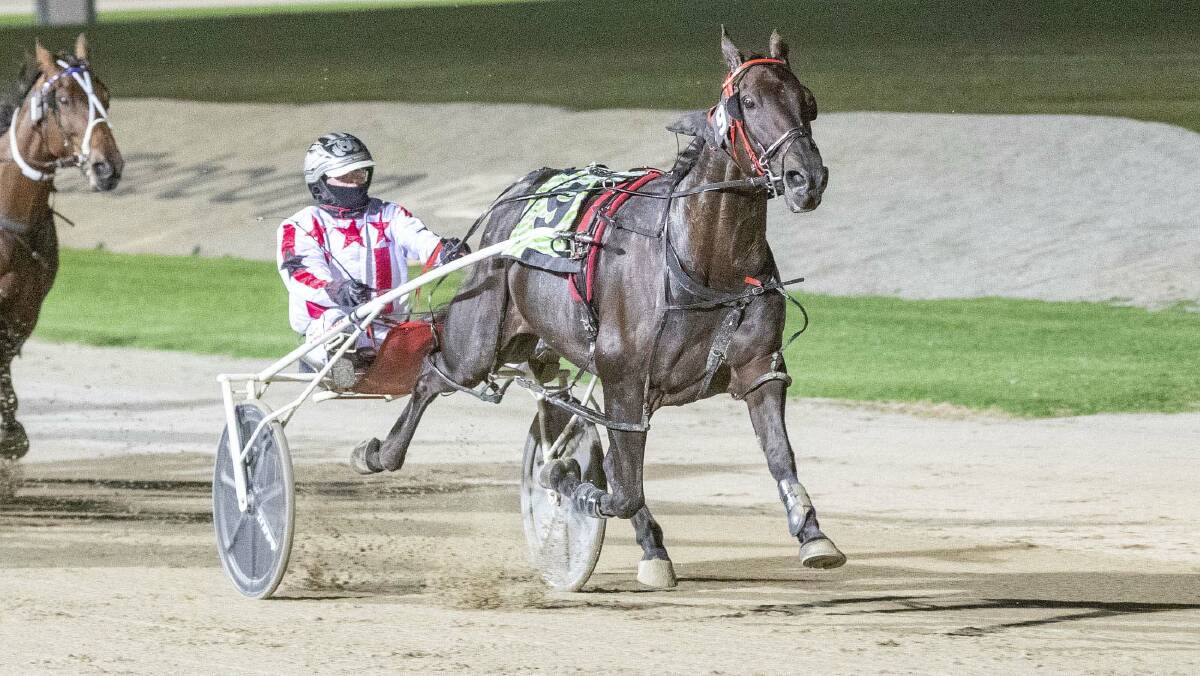 Michelle Phillips steers the Chris Svanosio-trained and Robert Rothacker-owned Repeat After Me to victory at Melton on Saturday night. Picture: STUART McCORMICK
