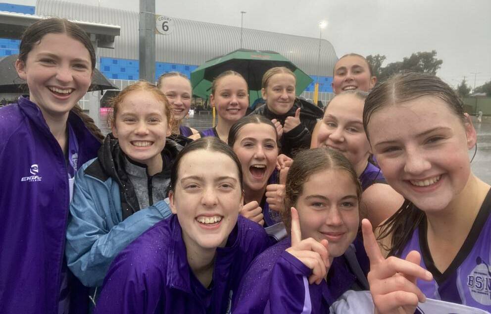 The Bendigo Strathdale Netball Association team celebrates after qualifying for the Netball Victoria Association Championships by finishing top-two at the last month's regional qualifiers in Bendigo.