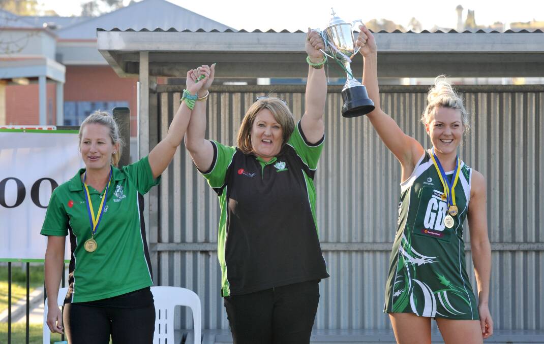 Lauren Bowles, Jannelle Hobbs ad Alicia McGlashan celebrate BFNL premiership success with Kangaroo Flat in 2014.