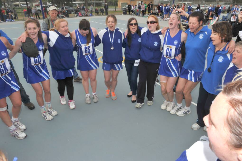 Mitiamo players celebrate after the club's last A-grade flag in 2012.