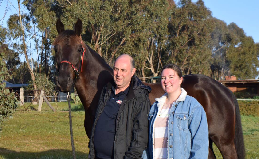 Axedale trainer Mick Carbone and daughter Stacie with Lets Make Tracks. Picture: KIERAN ILES
