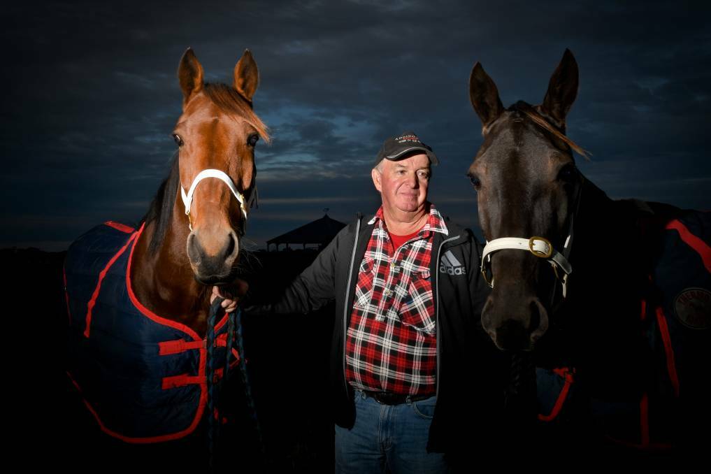 Marong trainer Trevor Patching with Pippa One Two and Busters Grin. Picture: NONI HYETT