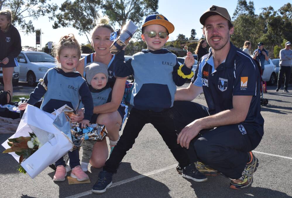 FAMILY TIME: Lauren Miller celebrates her 150th game for Eaglehawk with husband Henry and their children Annabel, Ted and Sam at Dower Park on Saturday. Picture: KIERAN ILES