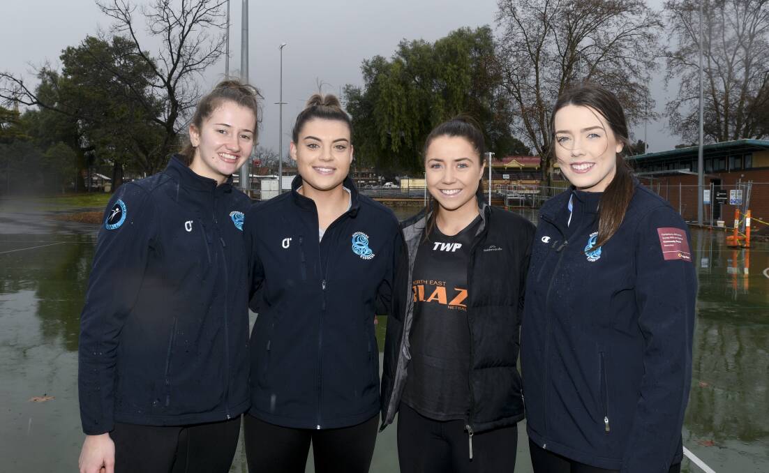 Ruby Barkmeyer, Chelsea Sartori, Meg Williams and Abbey Ryan gather back home in Bendigo before their VNL division one grand final clash. Picture: NONI HYETT