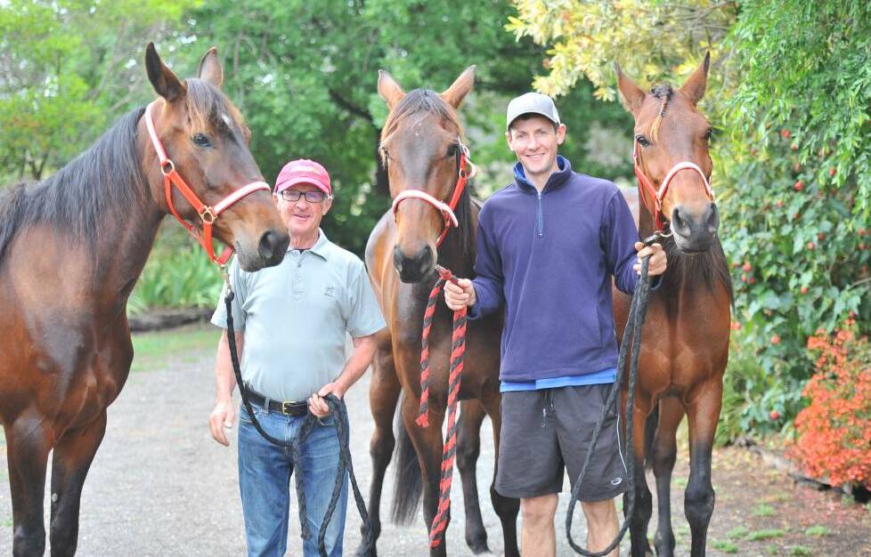 Trainer Chris Svanosio and father Peter with trotting trio Magicool, Kyvalley Finn and Norquay, who all won on the same night at Melton, in early November. Picture: KIERAN ILES