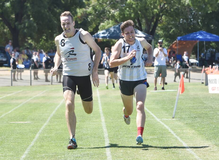 Glenn McMillan edges past Ashton Macdonald to win the open 1600m at the Maryborough Gift for the second year in a row in 2019. Picture: DARREN HOWE