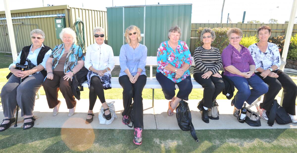 The players' wives and other interested spectators take in the action at the Kangaroo Flat Bowls Club.