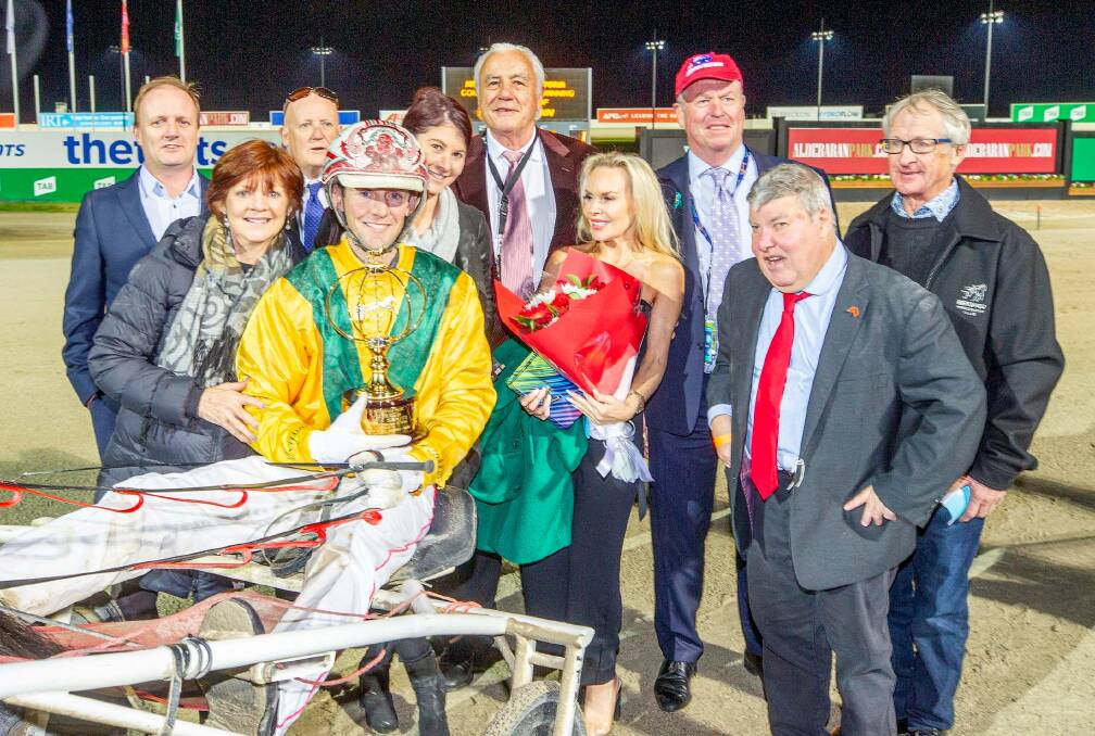 Connections of Kyvalley Finn celebrate Friday night's Group 1 success. Picture: STUART McCORMICK