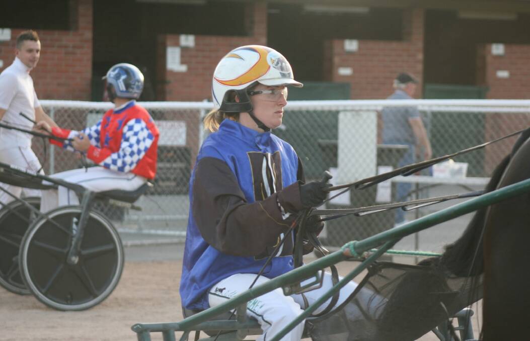 Ellen Tormey took the driving honours at Mildura on Wednesday night by driving four winners, including a double for her father John Tormey.. Picture: CHARLI MASOTTI PHOTOGRAPHY