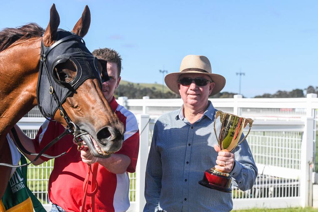 Trainer Shane Fliedner with Hi Stranger following their win in this month's $160,000 Kilmore Cup. Picture: BRETT HOLBURT/RACING PHOTOS