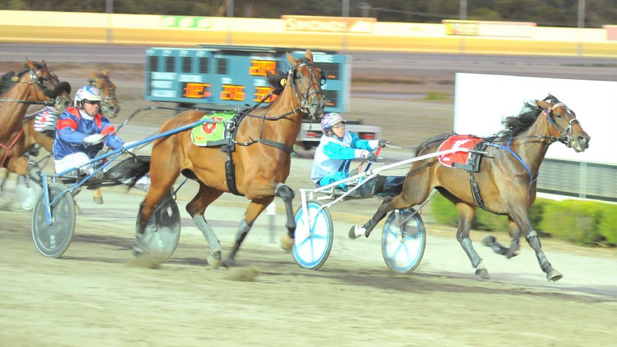 Kate Gath and Moonlight Dream win the opening heat of the Lyn McPherson Memorial Breed for Speed Silver Series at last year's teal night meeting. Picture: KIERAN ILES