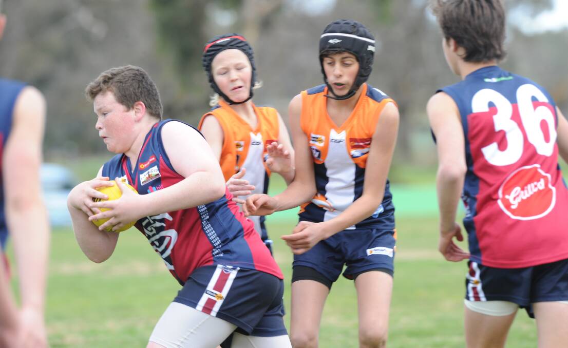 IN CONTROL: Sandhurst kept its under 14 reserves 2 season alive with an impressive victory against Maiden Gully YCW on Sunday at White Hills. Picture: NONI HYETT