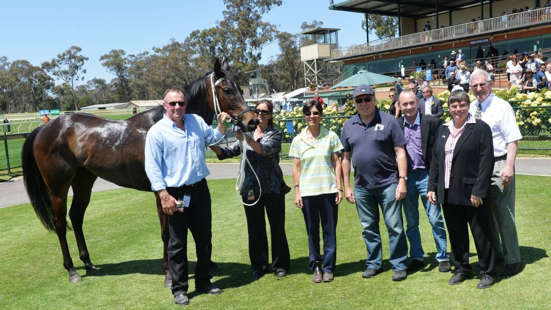 Brad Cole (right) with Stella The Boss and winning connections. Picture: DARREN HOWE