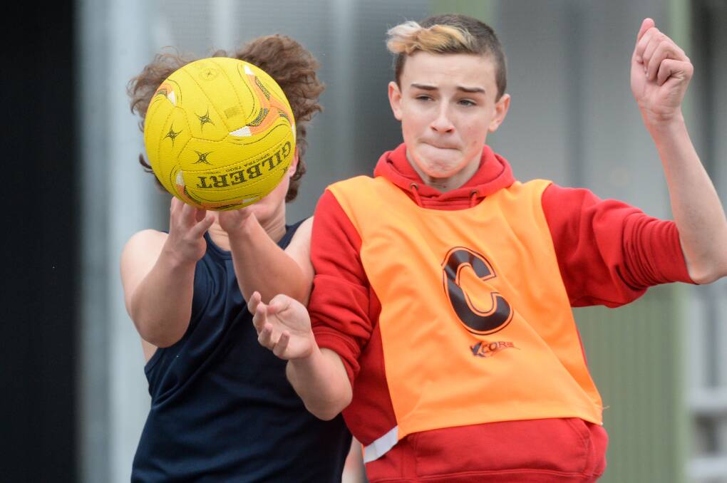 BOYS TAKE TO THE COURT: Enthusiasm and skills were on show at an all-boys netball clinic in Bendigo in September. Picture: DARREN HOWE