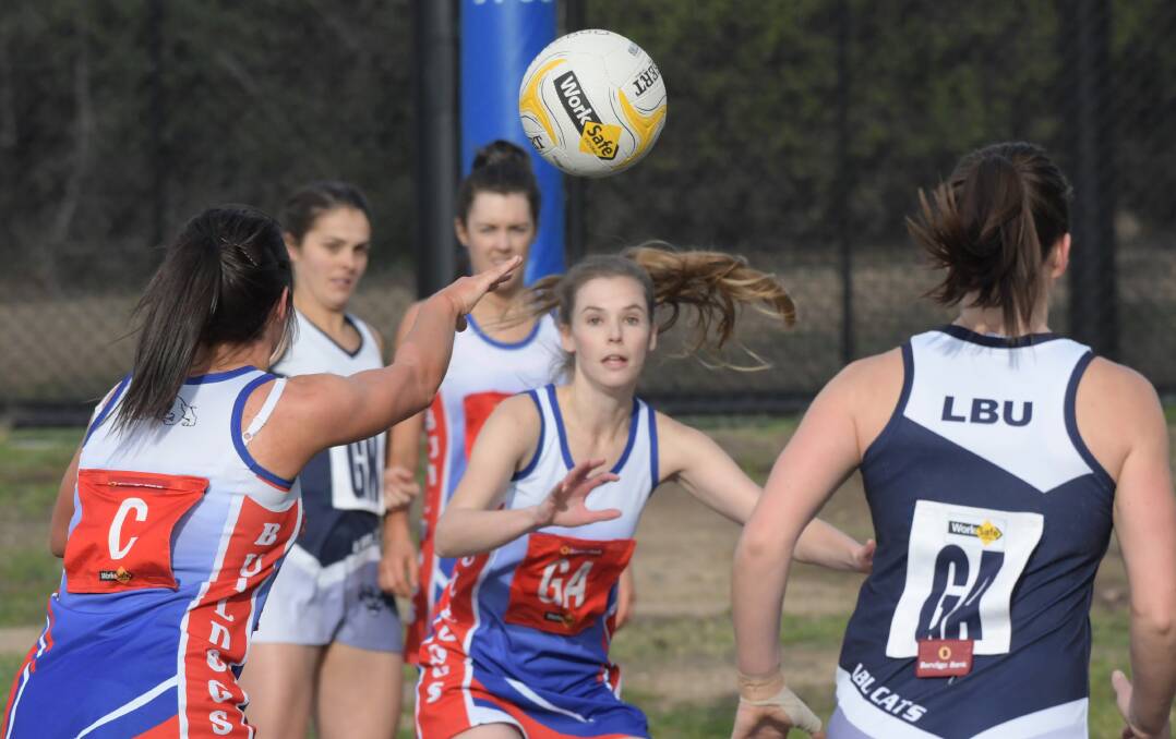 North Bendigo's Taylah Klemm targets team-mate Ruby Scanlon with this pass from centre during Saturday's game won 55-40 by the Bulldogs.