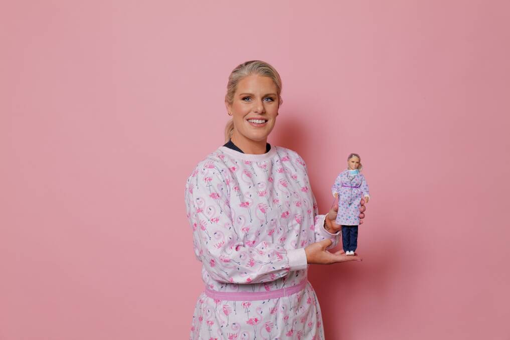 Bendigo specialist general practitioner and co-founder of Gowns for Doctors Dr Kirby White with her Barbie.