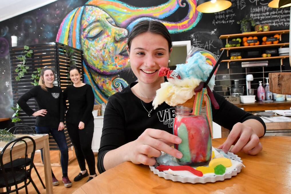 Vibe Street Eats' Chalina Moroney with a freak shake and Katie Williamson and owner Tara Hilson. Picture: NONI HYETT.