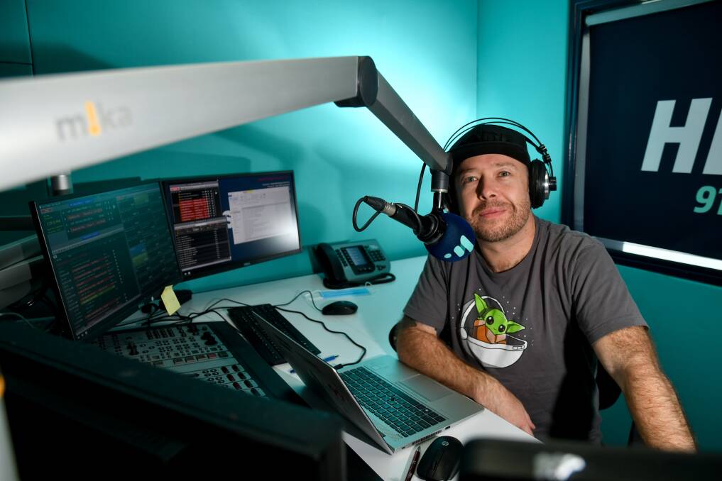 HIT FM's Michael Billings with his new podcast supporting DonateLife, which talks about the importance of organ donations. Picture: NONI HYETT