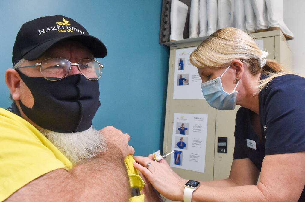 Bendigo Health vaccinating Hazeldene worker Greg Exon. Picture: DARREN HOWE
