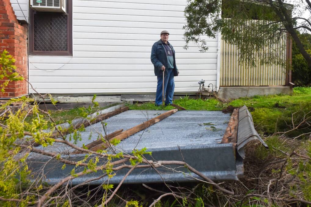 WIND: The Eaglehawk Pony Club's roof which landed in the yard of Ernie Harland's house. Picture: DARREN HOWE
