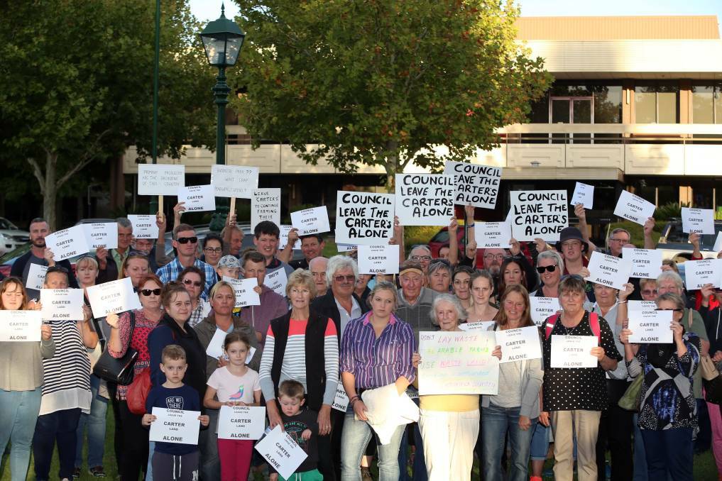 IN SUPPORT: Community members rallied behind the Carter family at a council meeting last week, where council voted to progress the forced sale of the family's land. Picture: GLENN DANIELS
