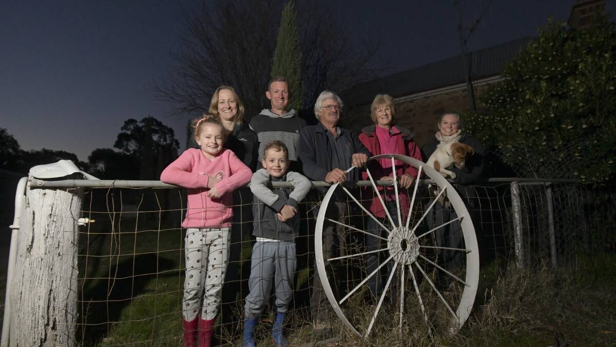 Children Jemma and Liam Carter, Kim Carter, Greg Carter, Max and Pauline Carter, Tamrie Carter and Hamish the dog on Tuesday. Picture: NONI HYETT
