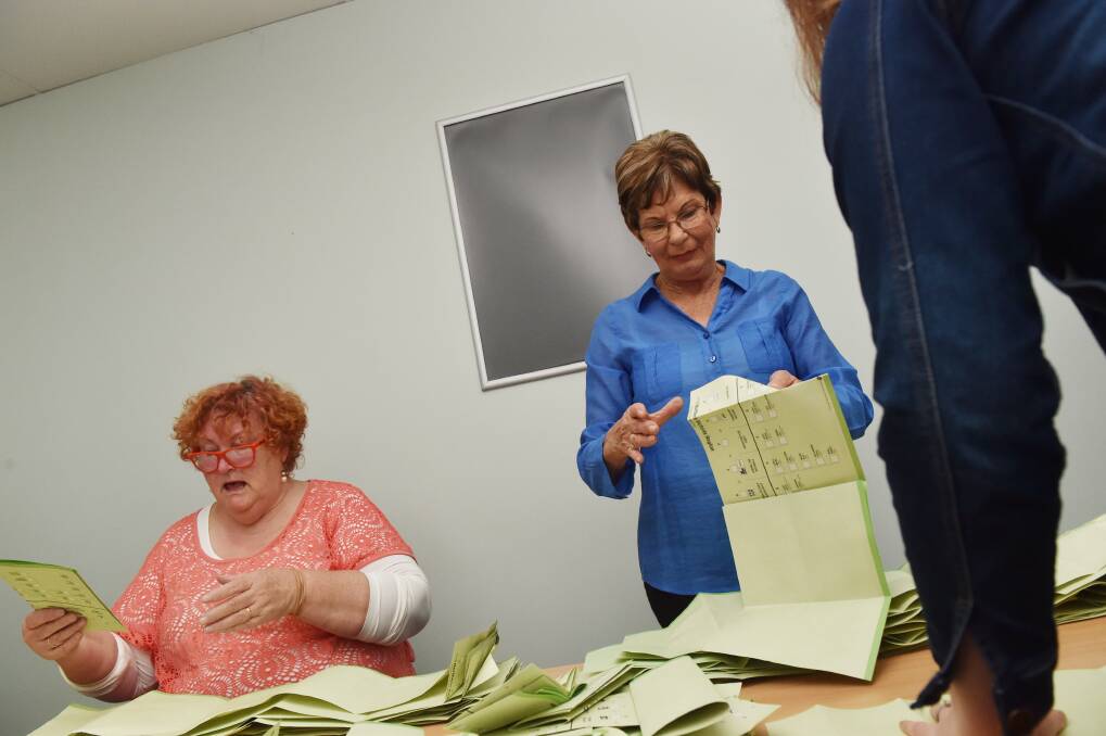 Votes being counted on election night. Picture: DARREN HOWE