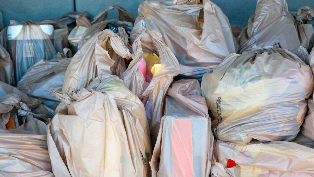 By July 2018, single-use plastic bags will no longer be given out at Woolworths stores. Photo: iStock