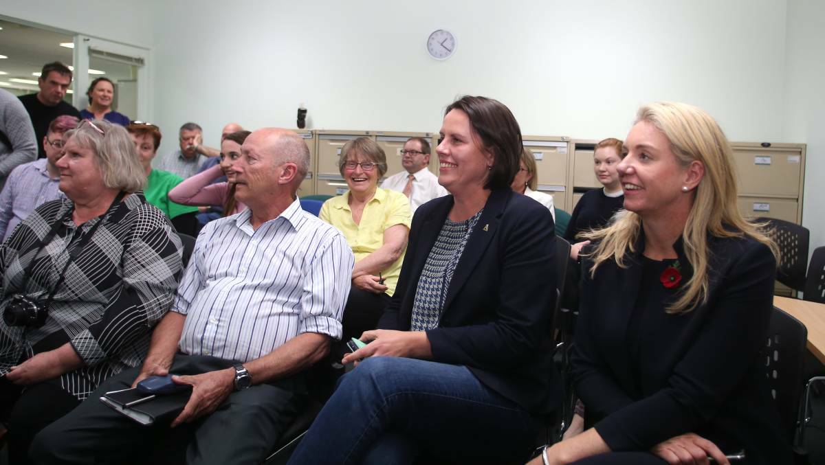 Ian Ellis and Gaelle Broad, for the Liberal and National parties in Bendigo East, watch the ballot draw in Strathdale earlier this month Picture: GLENN DANIELS.
